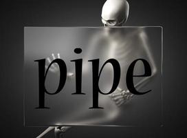 pipe word on glass and skeleton photo