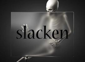 slacken word on glass and skeleton photo
