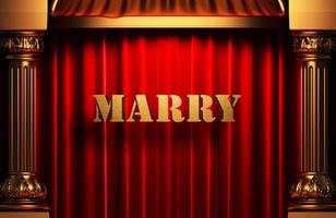 marry golden word on red curtain photo