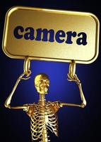 camera word and golden skeleton photo