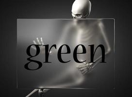 green word on glass and skeleton photo