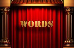 words golden word on red curtain photo