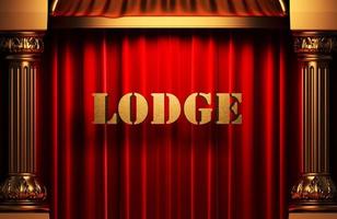 lodge golden word on red curtain photo