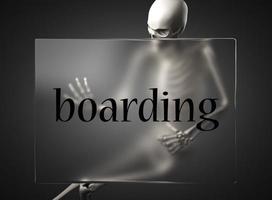 boarding word on glass and skeleton photo