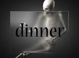 dinner word on glass and skeleton photo