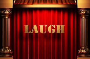 laugh golden word on red curtain photo