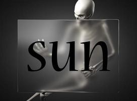 sun word on glass and skeleton photo