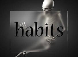 habits word on glass and skeleton photo