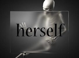 herself word on glass and skeleton photo