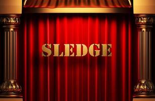 sledge golden word on red curtain photo