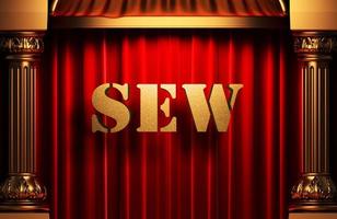 sew golden word on red curtain photo