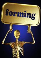 forming word and golden skeleton photo