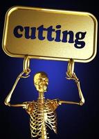 cutting word and golden skeleton photo