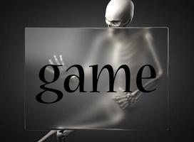 game word on glass and skeleton photo