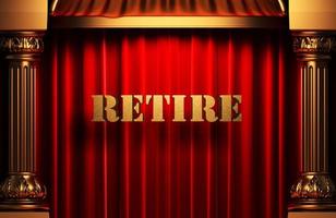 retire golden word on red curtain photo