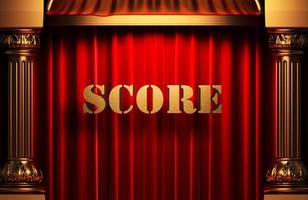 score golden word on red curtain photo