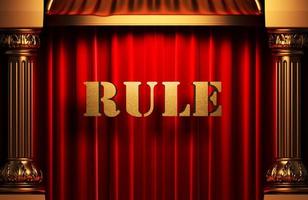 rule golden word on red curtain photo