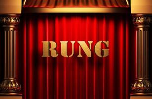 rung golden word on red curtain photo