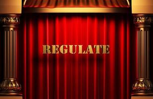 regulate golden word on red curtain photo