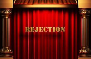 rejection golden word on red curtain photo