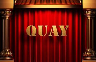 quay golden word on red curtain photo