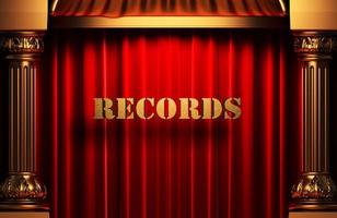 records golden word on red curtain photo