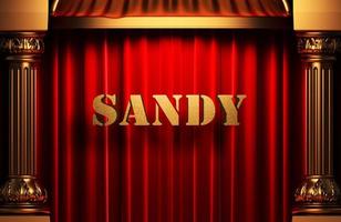 sandy golden word on red curtain photo