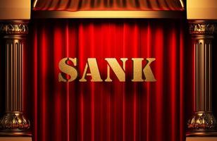 sank golden word on red curtain photo