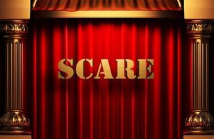 scare golden word on red curtain photo