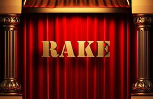 rake golden word on red curtain photo