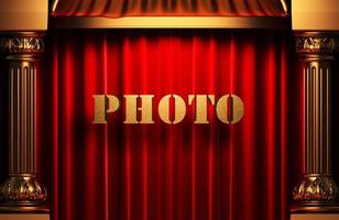 photo golden word on red curtain