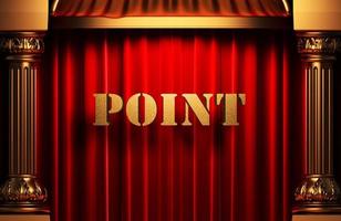 point golden word on red curtain photo