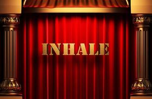 inhale golden word on red curtain photo