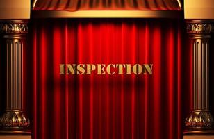 inspection golden word on red curtain photo