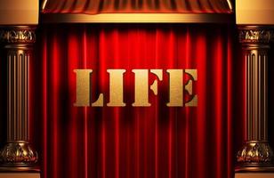 life golden word on red curtain photo