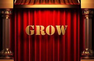 grow golden word on red curtain photo