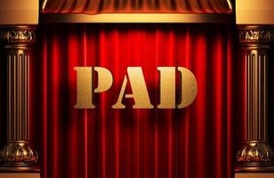pad golden word on red curtain photo