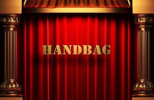 handbag golden word on red curtain photo