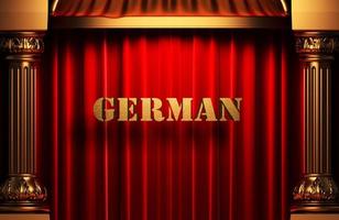 german golden word on red curtain photo