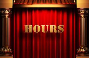 hours golden word on red curtain photo