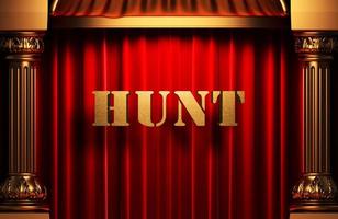 hunt golden word on red curtain photo