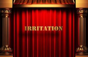irritation golden word on red curtain photo