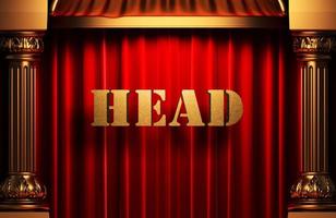 head golden word on red curtain photo