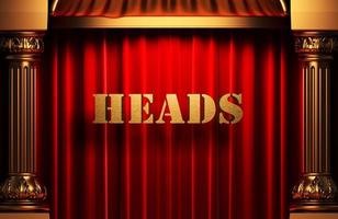 heads golden word on red curtain photo