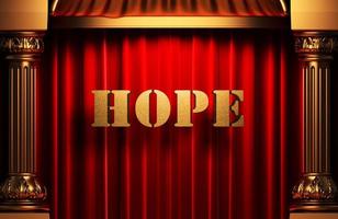 hope golden word on red curtain photo