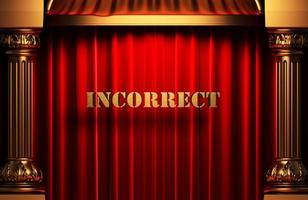 incorrect golden word on red curtain photo