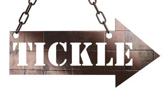 tickle word on metal pointer photo