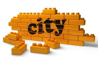 city word on yellow brick wall photo