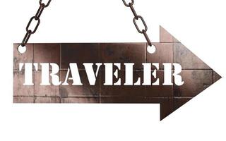 traveler word on metal pointer photo