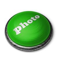 palabra de foto en el botón verde aislado en blanco